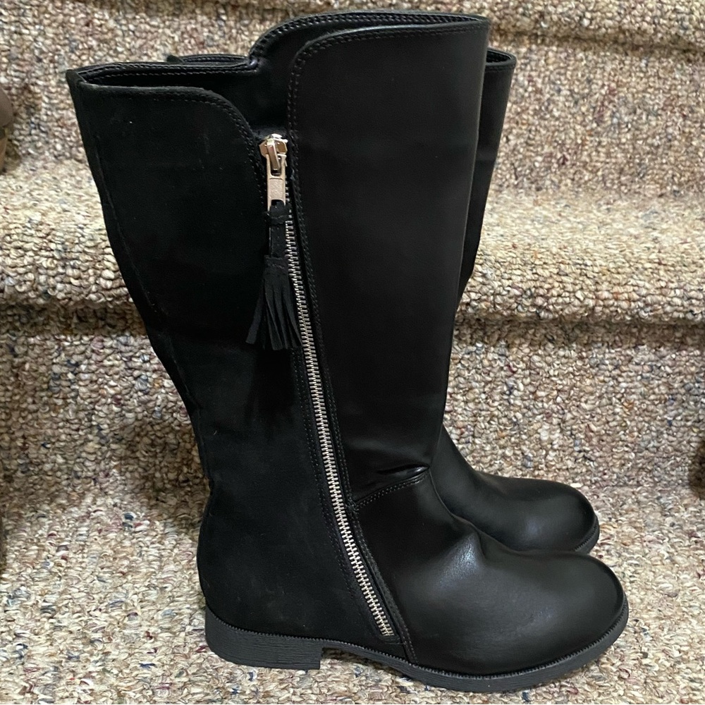Black riding boots with silver hardware